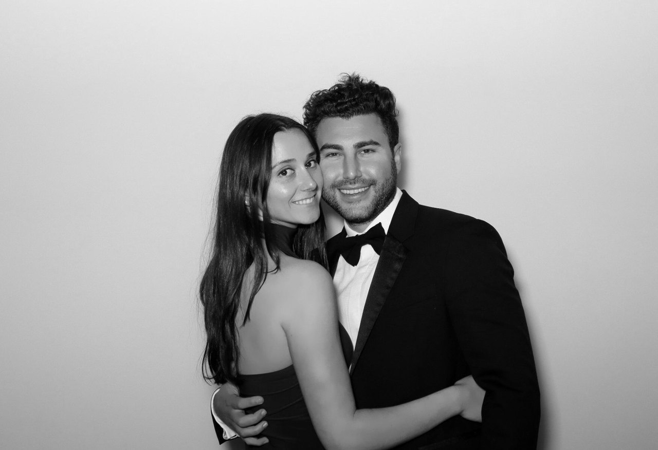 A black-and-white photo of Gabriella and Joshua dressed up together