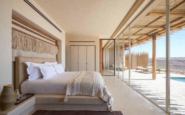 Panorama Pool Villa bedroom opening onto the pool terrace