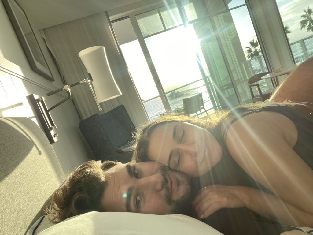Gabriella and Joshua snuggled up on a plane
